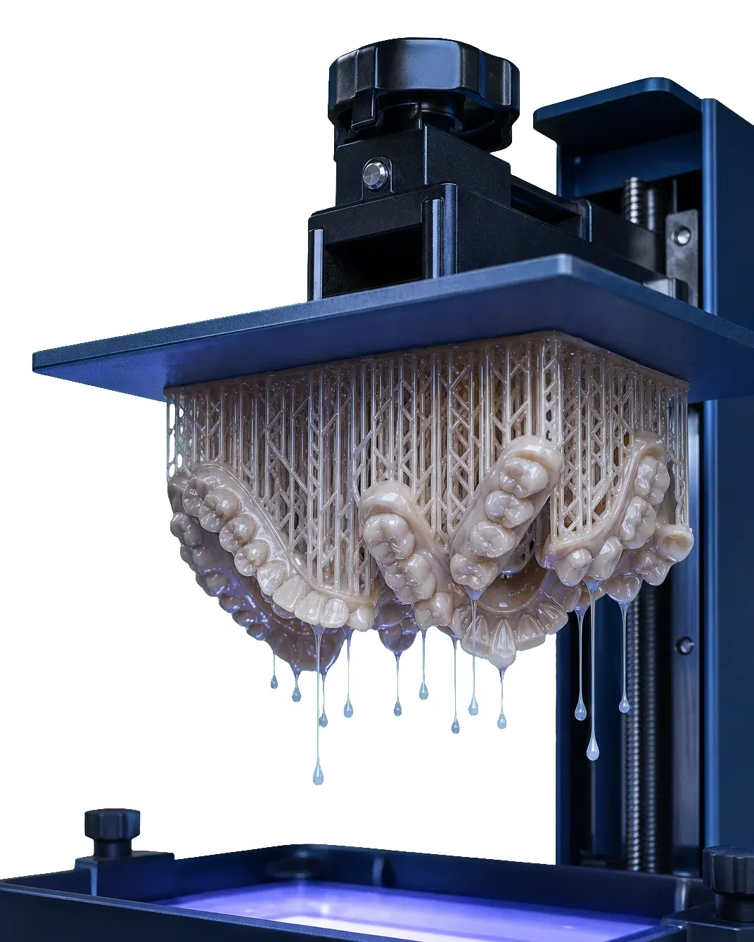 A dental 3D-printer build plate with multiple printed parts, showing production at volume.